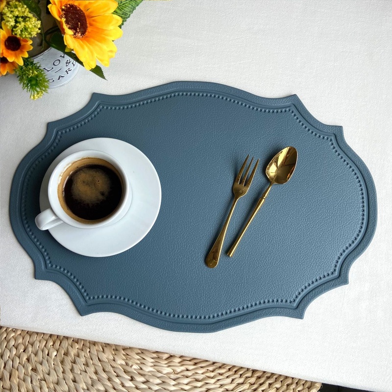 4 pcs Retro Faux Leather Placemat – Waterproof & Oil-Proof Dining Table Mat (Light blue)